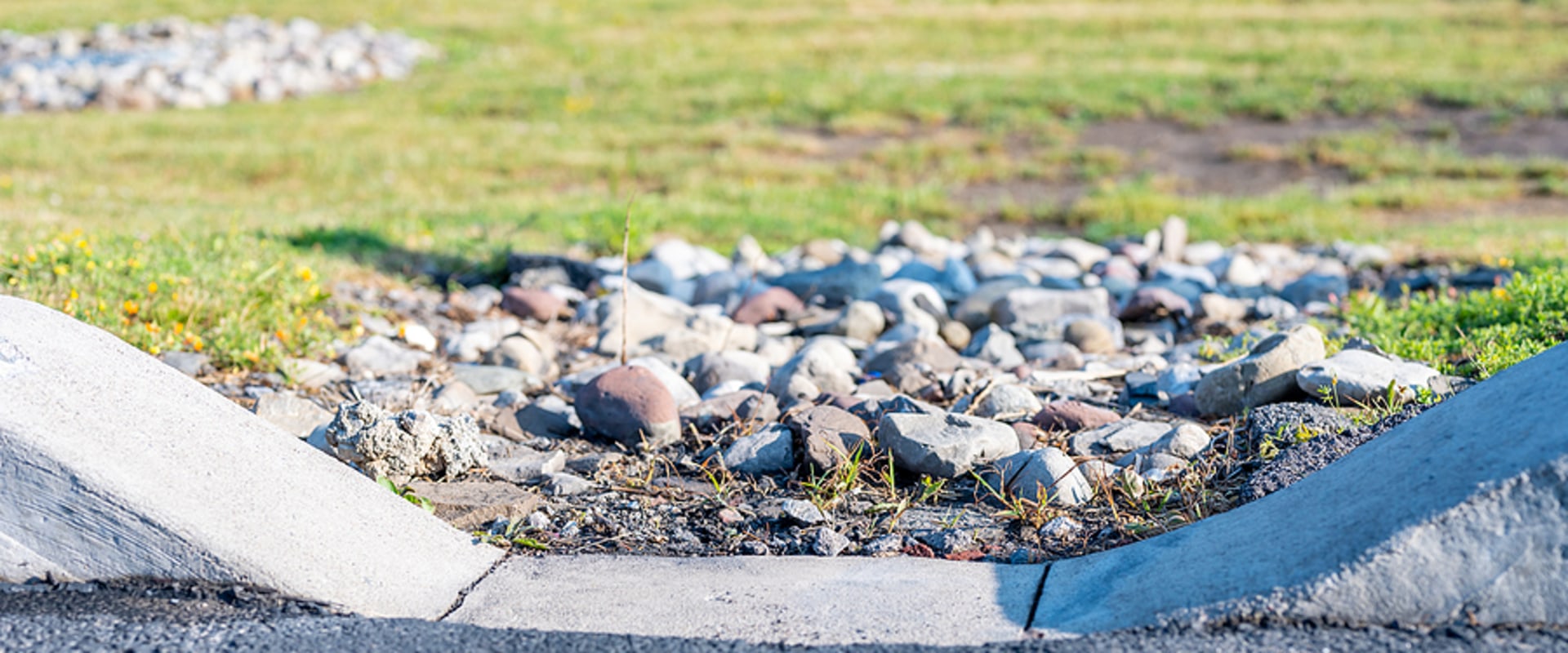 Why Poor Roof Drainage Can Shorten the Lifespan of Commercial Pavement Surfaces
